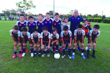 Los gurises de Club Remeros Salto  que participan en la Copa Oro.